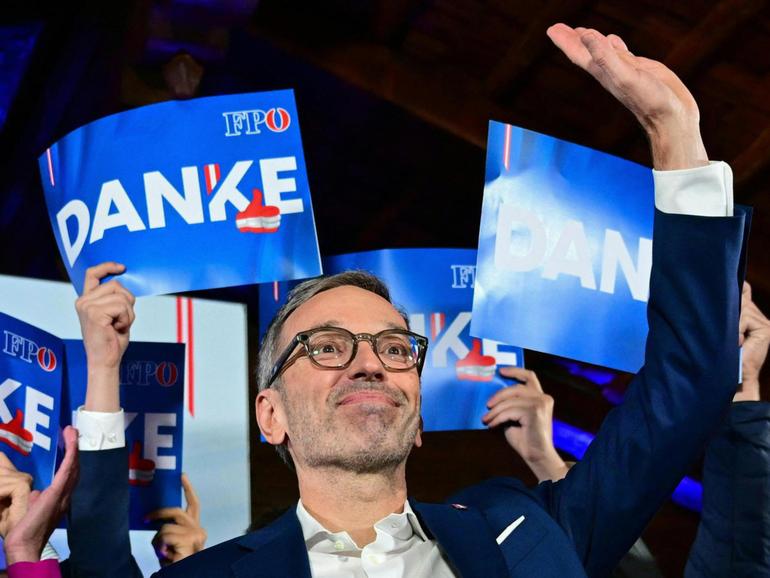 Herbert Kickl, leader and top candidate of right-wing populist Freedom Party of Austria (FPOe) waves to supporters.