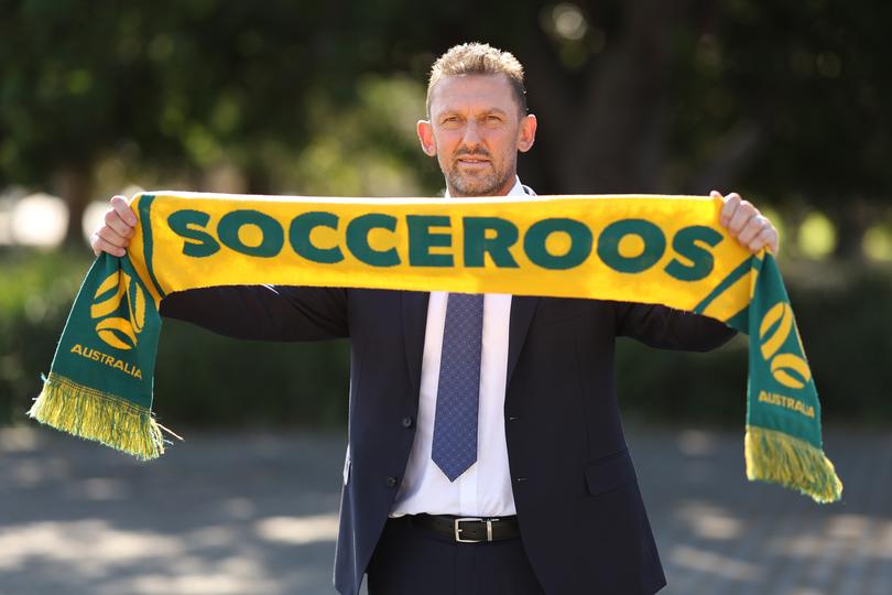 Tony Popovic poses during a Football Australia announcement.