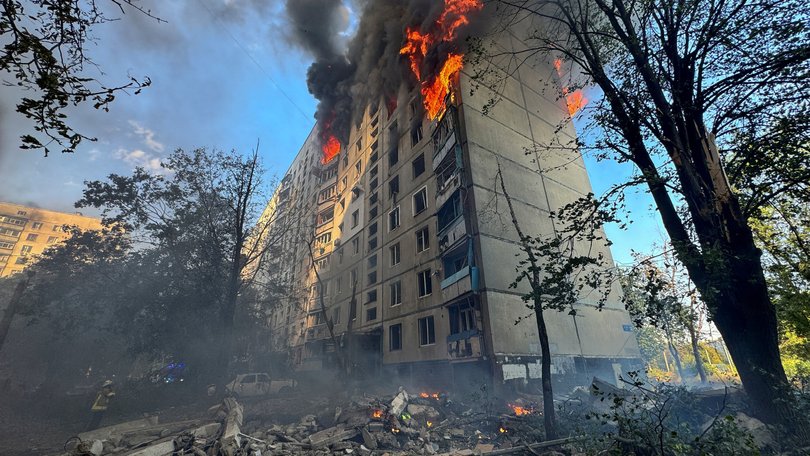 A burning apartment building hit by a Russian air strike in Kharkiv, Ukraine.