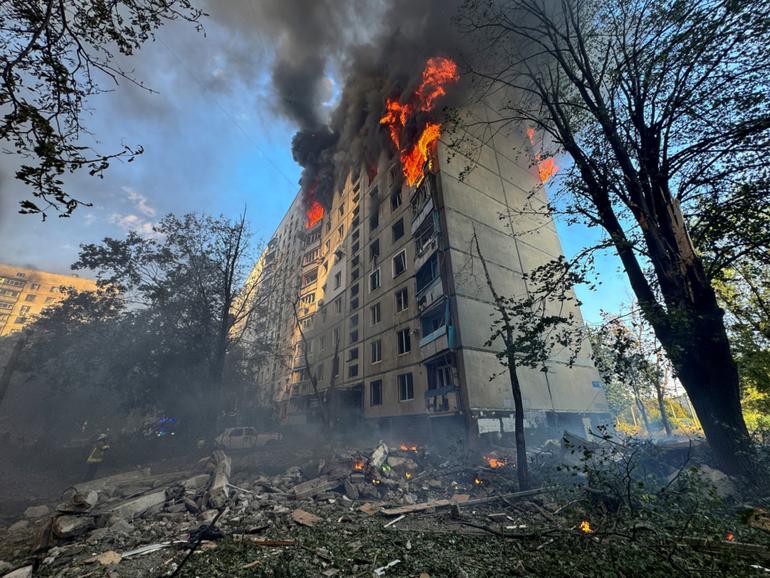 A burning apartment building hit by a Russian air strike in Kharkiv, Ukraine.