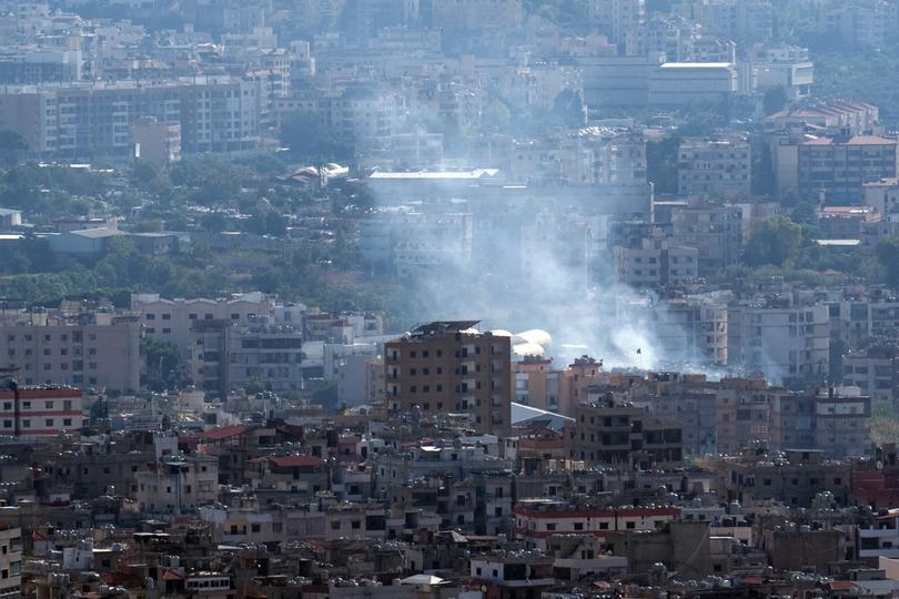 BEIRUT, LEBANON - SEPTEMBER 29: Smoke rises from the site of Israeli airstrikes on September 29, 2024 in Beirut, Lebanon. Hezbollah, the Iran-backed Lebanese militant and political group, confirmed that its longtime leader Hassan Nasrallah was killed in an Israeli strike on Sept. 27 in its stronghold in Dahieh, a southern suburb of Beirut. Israel has launched further strikes against alleged Hezbollah targets in Lebanon in the days since, marking a sharp escalation of the current conflict. (Photo by Carl Court/Getty Images)