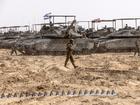 Israeli reservists on their tanks at a IDF staging area near the border of Gaza in southern Israel on May 21. MUST CREDIT: Heidi Levine for The Washington Post