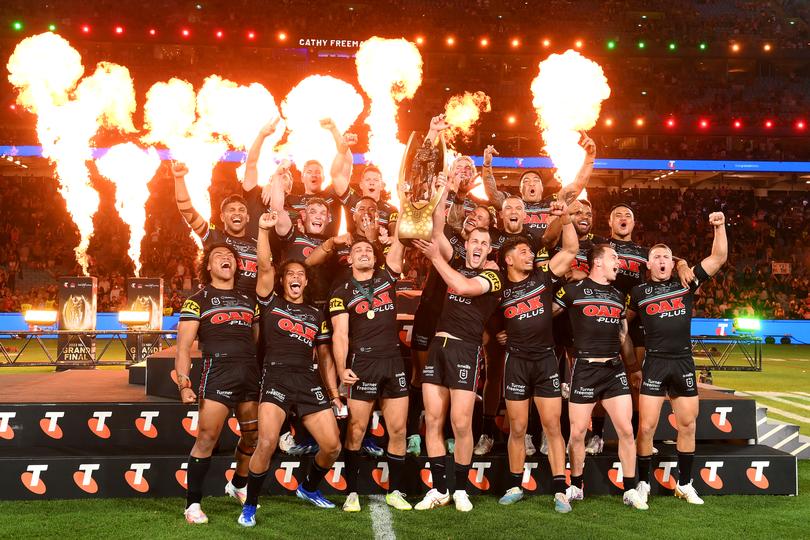 SYDNEY, AUSTRALIA - OCTOBER 01: Panthers celebrate with the trophy during the 2023 NRL Grand Final match between Penrith Panthers and Brisbane Broncos at Accor Stadium on October 01, 2023 in Sydney, Australia. (Photo by Bradley Kanaris/Getty Images)