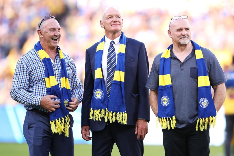 SYDNEY, AUSTRALIA - APRIL 22: Brett Kenny, Peter Wynn and Eric Grothe watch on before kick off during the round 6 NRL match between the Parramatta Eels and Wests Tigers at Bankwest Stadium on April 22, 2019 in Sydney, Australia. (Photo by Mark Kolbe/Getty Images)