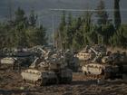 Israeli tanks gather by the Israeli-Lebanese border for a ground invasion that will reportedly commence within hours. 