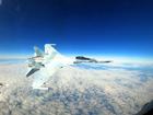 The Russian fighter jet coming within metres of a US F-16.  