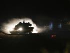 An Israeli tank manoeuvres in northern Israel near the Israel-Lebanon border, Monday, Sept. 30, 2024. (AP Photo/Baz Ratner)