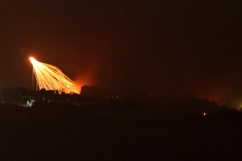 Israeli artillery shells hit areas near villages in southern Lebanon along the border with Israel, as seen from the Upper Galilee, northern Israel.