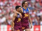 Joe Daniher (right), seen with CharlieCameron after the grand final, is contemplating retirement. (James Ross/AAP PHOTOS)