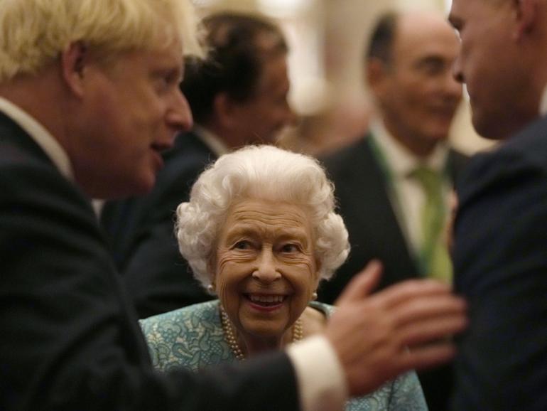 Former prime minister Boris Johnson, left, said Queen Elizabeth died after suffering from bone cancer. 