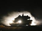 An Israeli tank manoeuvres in northern Israel near the Israel-Lebanon border. 