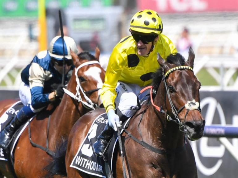 Mark Zahra celebrates back-to-back Melbourne Cups after riding Without A Fight to victory in 2023.