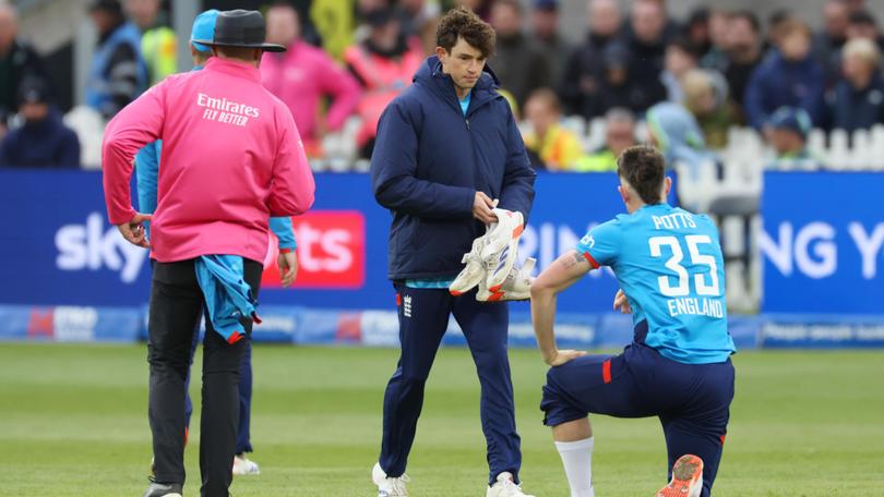  Matthew Potts changes his shoes during the 5th ODI between England and Australia,.