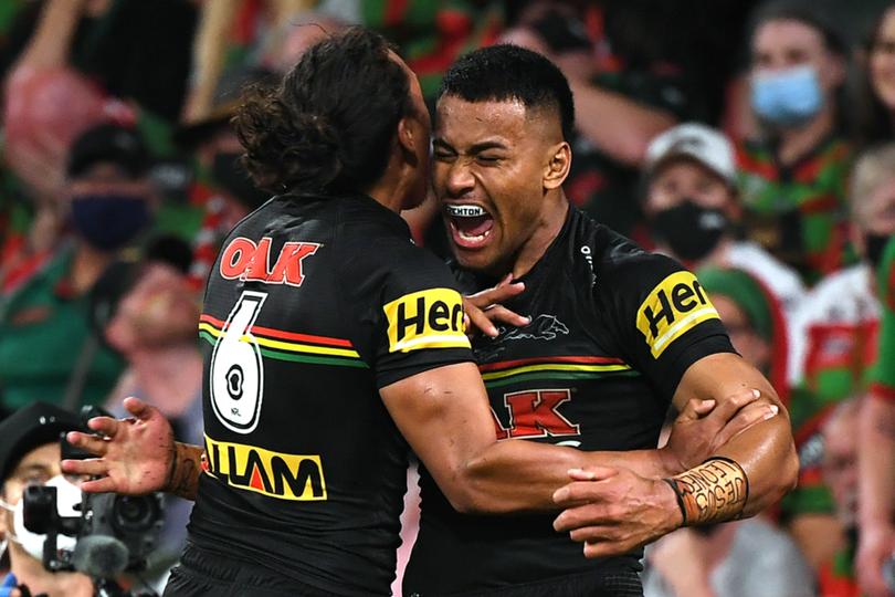 Panthers Stephen Crichton (R) celebrates with Jarome Luai  after scoring a try during the NRL Grand Final between the Penrith Panthers and South Sydney Rabbitohs at Suncorp Stadium in Brisbane, Sunday, October 3, 2021. (AAP Image/Dave Hunt) NO ARCHIVING, EDITORIAL USE ONLY