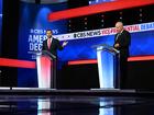 Sen. JD Vance (R-Ohio) speaks as Gov. Tim Walz of Minnesota listens during the vice-presidential debate.