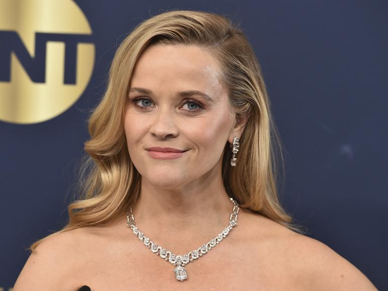 Reese Witherspoon will co-write a book with popular novelist Harlan Coben.