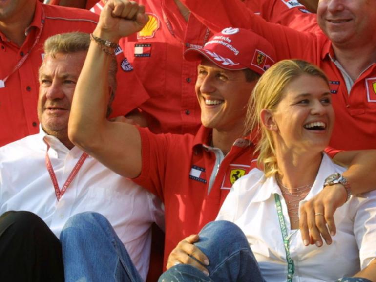 Former manager Willi Weber, with Michael Schumacher and wife Corinna in 2001. 
