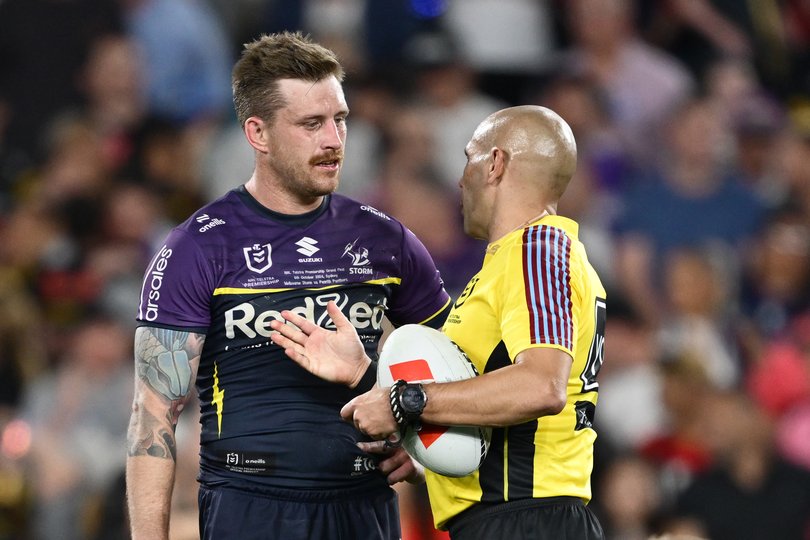 SYDNEY, AUSTRALIA - OCTOBER 06: Cameron Munster of the Storm speaks to referee Ashley Klein at full time following the 2024 NRL Grand Final match between the Melbourne Storm and the Penrith Panthers at Accor Stadium on October 06, 2024, in Sydney, Australia. (Photo by Quinn Rooney/Getty Images)