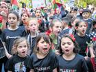 Children seen chanting "Free Palestine" during the demonstration. 