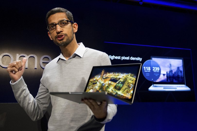 Sundar Pichai, senior vice president for Chrome at Google Inc., holds up a new Chromebook Pixel as he speaks during a launch event in San Francisco, California, U.S., on Thursday, Feb. 21, 2013. Google Inc., owner of the worldís most popular search engine, debuted a touchscreen version of the Chromebook laptop, stepping up its challenge to Microsoft Corp. and Apple Inc. in hardware. Photographer: David Paul Morris/Bloomberg *** Local Caption *** Sundar Pichai