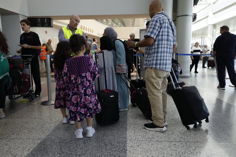 Australian Government officials assisting Australians to depart Lebanon.