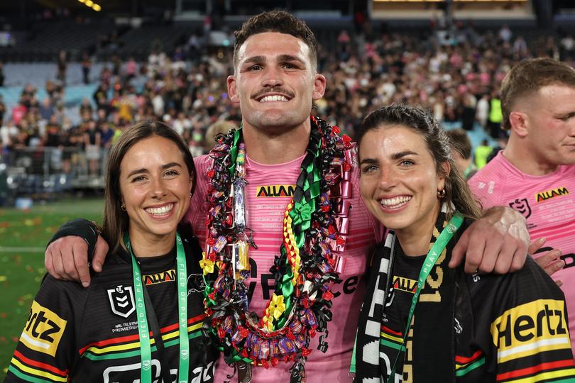 SYDNEY, AUSTRALIA - OCTOBER 06:  Nathan Cleary of the Panthers celebrates with Noemie Fox (L) and Jessica Fox () after winning the 2024 NRL Grand Final match between the Melbourne Storm and the Penrith Panthers at Accor Stadium on October 06, 2024, in Sydney, Australia. (Photo by Cameron Spencer/Getty Images)