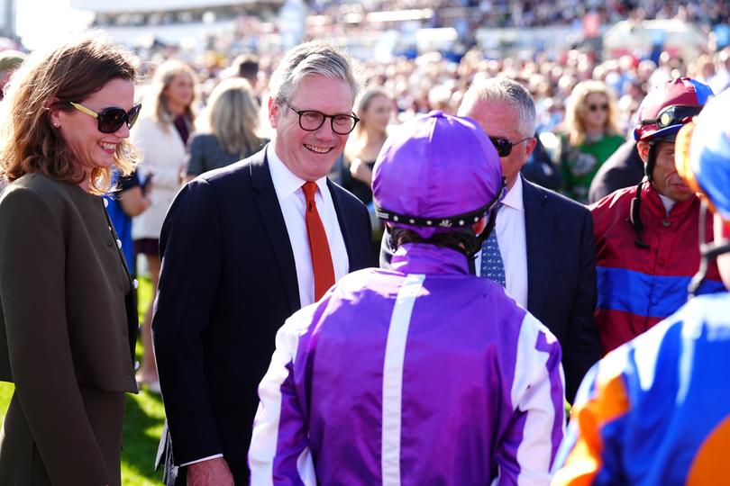 Prime Minister of the United Kingdom Keir Starmer and wife Victoria Starmer (left) speaks to the jockeys ahead of the Betfred St Leger Stakes on day three of the Betfred St Leger Festival at Doncaster Racecourse. Picture date: Saturday September 14, 2024. (Photo by Mike Egerton/PA Images via Getty Images)