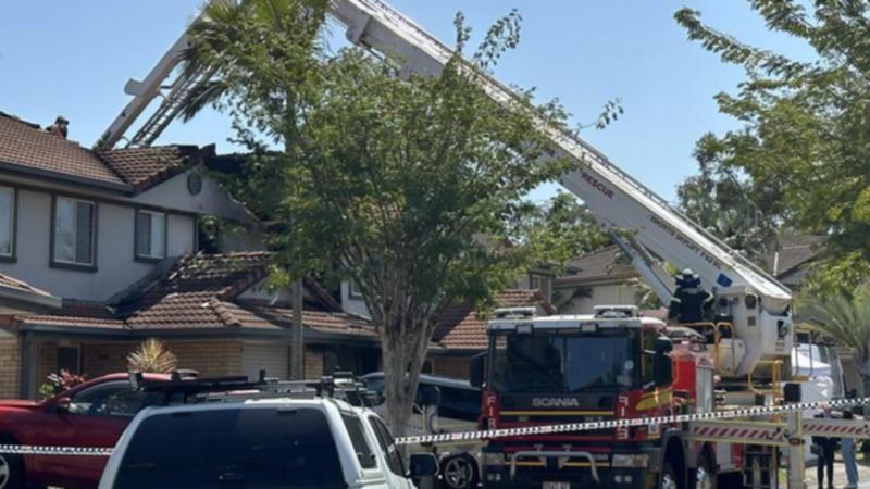 An eight-year-old girl and a 31-year-old woman died inside the house when it was gutted by fire. (Savannah Meacham/AAP PHOTOS)