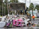 Crews are working to remove debris from Hurricane Helene before Hurricane Milton approaches Florida's west coast. (AP Photo/Chris O'Meara)