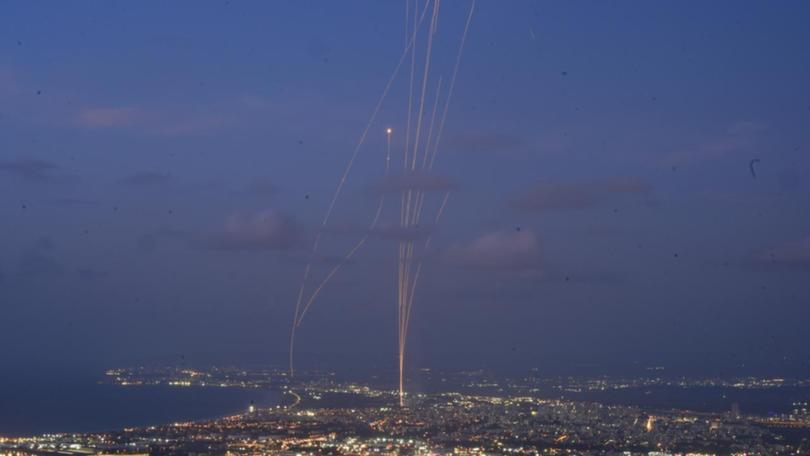 Israel's Iron Dome air defence system fired to intercept rockets that were launched from Lebanon. (AP PHOTO)