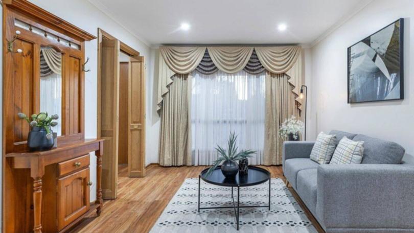In Adelaide's north, a spacious family home at 11 Brion Drive, Paralowie, attracted 18 registered bidders at auction.