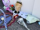 Flowers, cards and toys were left outside the Thorneside home where a girl and her babysitter died.