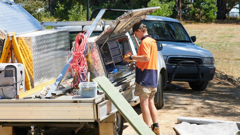 A plumber has been slapped with a fine after driving his ute with a young apprentice in the toolbox. Stock image. 