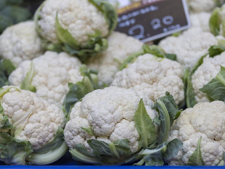 A shopper has been left needing hospital treatment after being hit in the head by a falling cauliflower. 