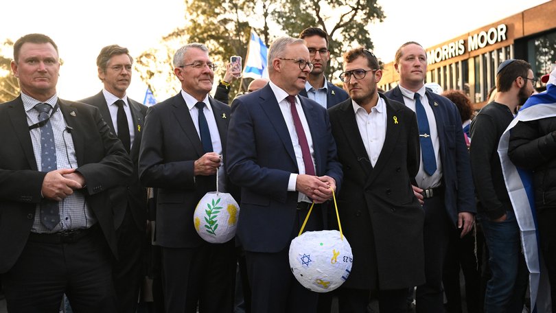 Australian Prime Minister Anthony Albanese (centre) during a Jewish community vigil marking the first anniversary of Hamas' October 7 attack on Israel in Moorabbin, Melbourne, Monday, October 7, 2024.