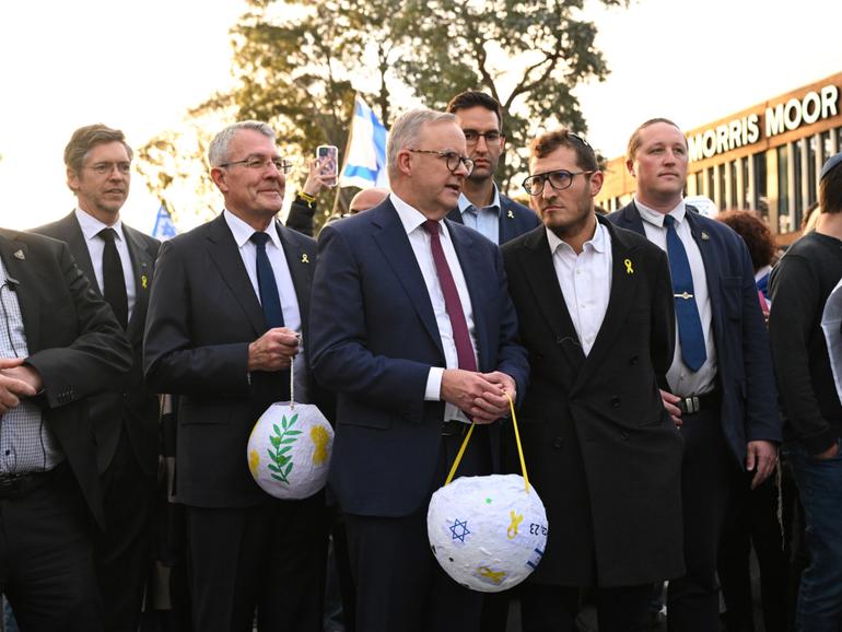 Australian Prime Minister Anthony Albanese (centre) during a Jewish community vigil marking the first anniversary of Hamas' October 7 attack on Israel in Moorabbin, Melbourne, Monday, October 7, 2024.