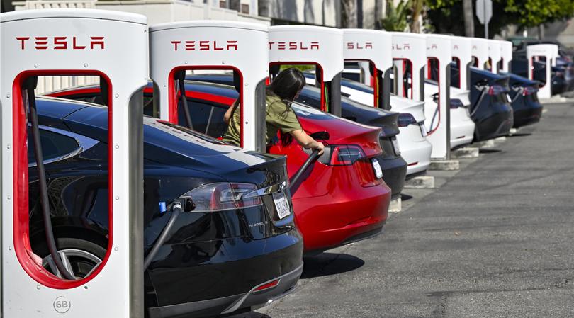 Santa Ana, CA - March 20: Drivers charge their Teslas in Santa Ana, CA, on Wednesday, March 20, 2024. The Biden administration on Wednesday, March 20, 2024, issued one of the most significant climate regulations in the nation's history, a rule designed to ensure that the majority of new passenger cars and light trucks sold in the United States are all-electric or hybrids by 2032.  (Photo by Jeff Gritchen/MediaNews Group/Orange County Register via Getty Images)