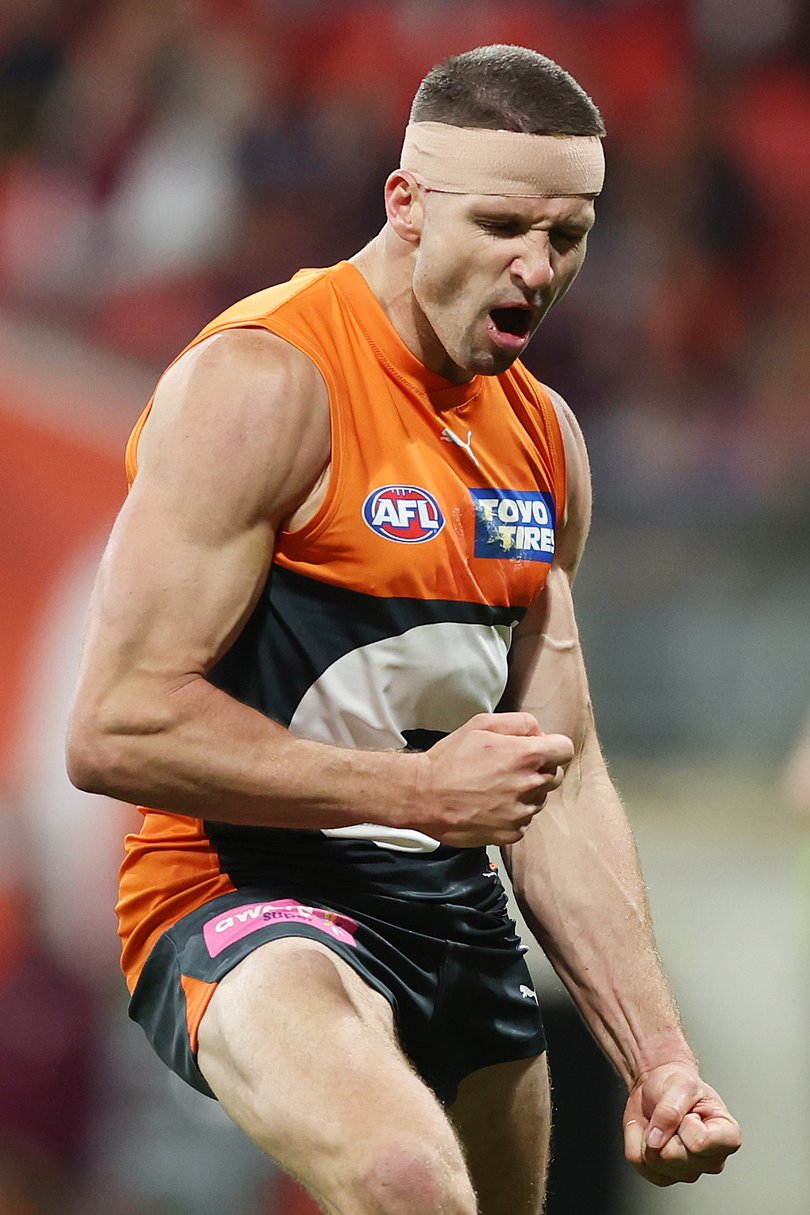 SYDNEY, AUSTRALIA - SEPTEMBER 14: Jesse Hogan of the Giants celebrates kicking a goal during the AFL First Semi Final match between GWS Giants and Brisbane Lions at ENGIE Stadium, on September 14, 2024, in Sydney, Australia. (Photo by Mark Metcalfe/AFL Photos/via Getty Images)