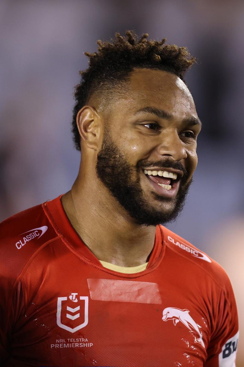 SYDNEY, AUSTRALIA - JUNE 13: Hamiso Tabuai-Fidow of the Dolphins celebrate victory following the round 15 NRL match between Cronulla Sharks and Dolphins at PointsBet Stadium on June 13, 2024 in Sydney, Australia. (Photo by Jason McCawley/Getty Images)