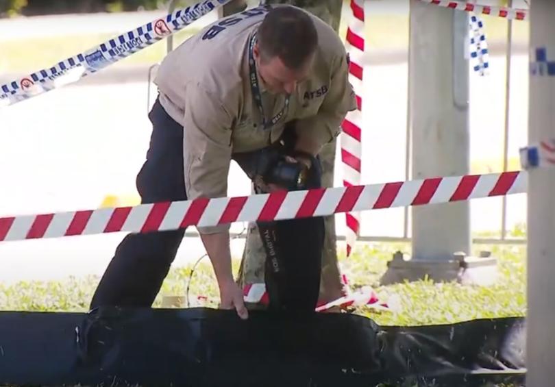 ATSB investigators at the scene of the helicopter crash.