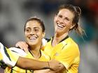 Elise Kellond-Knight (right) retires from professional football as a Australian great.