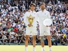 Carlos Alcaraz and Novak Djokovic pose after the 2024 final. 