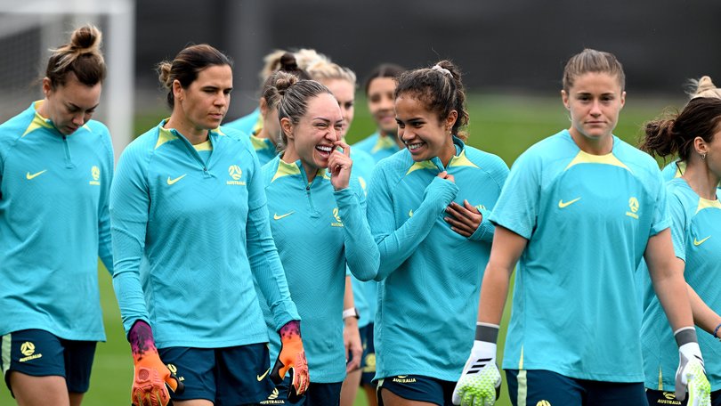 Mary Fowler and Kyah Simon share a laugh during an Australia Matildas training session last year.