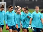 Mary Fowler and Kyah Simon share a laugh during an Australia Matildas training session last year.