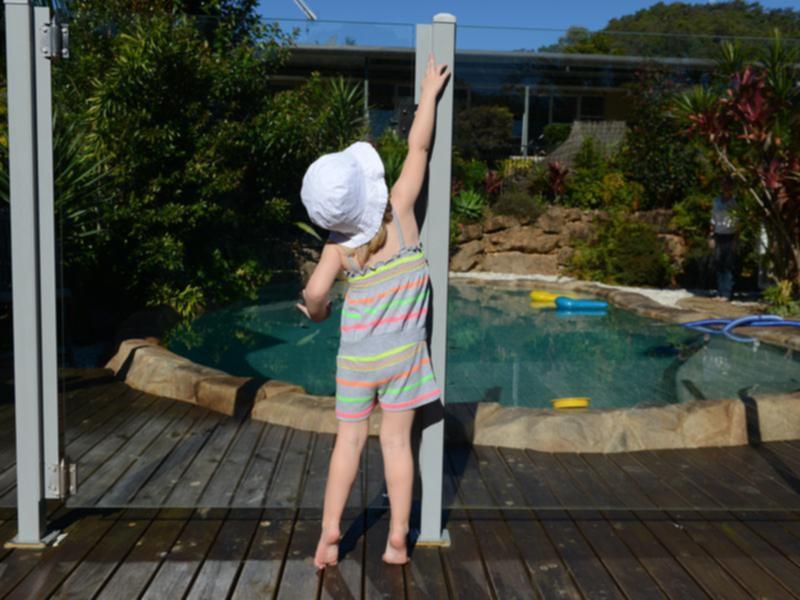 Child attempts to enter a pool area (file image)