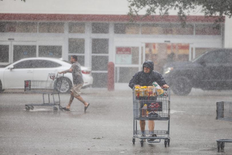 People get groceries in preparation for Hurricane Milton in Cape Coral, Fla.