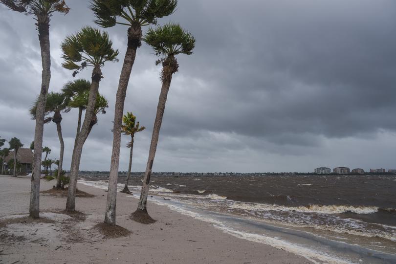 High winds from Hurricane Milton hit Yacht Club Beach in Cape Coral, Fla.