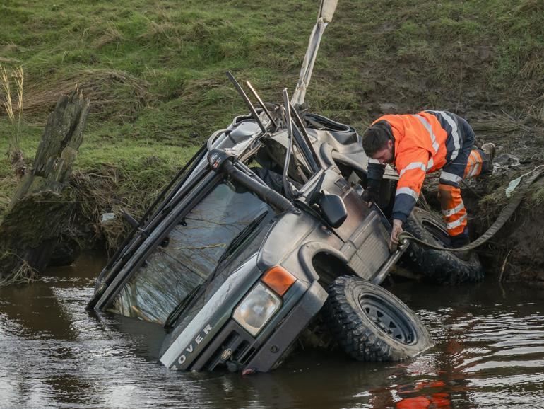 A Land Rover that three men died inside of when they became trapped as the vehicle sunk into the River Esk near Glaisdale, North Yorkshire. 