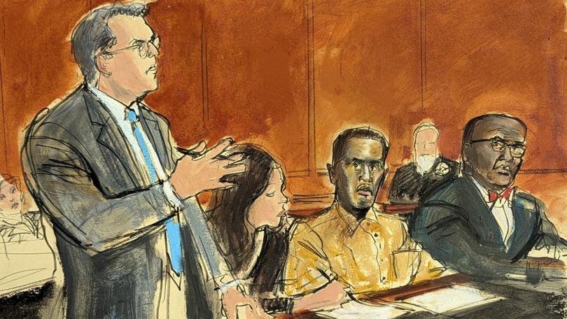 In this courtroom sketch, Sean "Diddy" Combs defence attorney Marc Agnifilo, left, addresses the judge while Combs, seated second from right, in prison uniform, watches in Federal court, in New York,