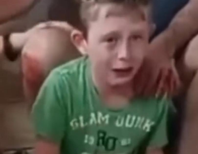 A still image of a Jewish child taken from a video that was live-streamed by Hamas terrorists after they shot his older sister. 